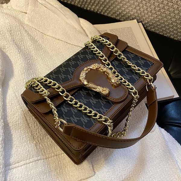 Jauna modeļa rokassomiņa ar metāla plecu ķēdi