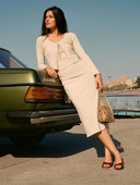 Γυναικείο πουλόβερ 2022 Άνοιξη και Καλοκαίρι Νέο μονόχρωμο casual λεπτό πλεκτό ζακέτα με κάθετο γιακά αμάνικο τοπ φούστα