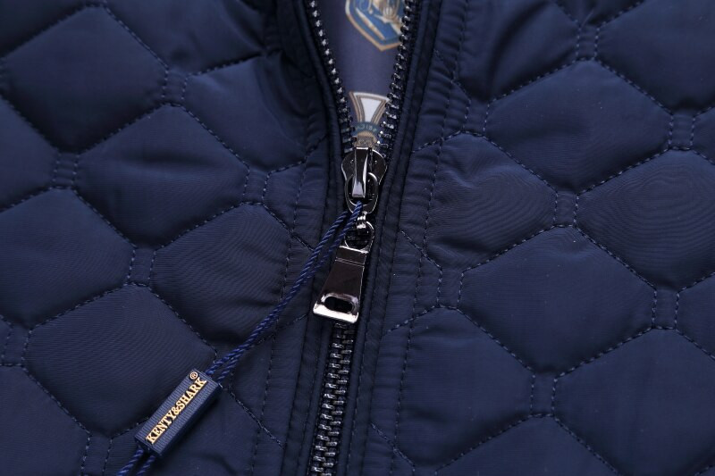 Kenty Shark zīmola vīriešu vestes uztur siltumu.