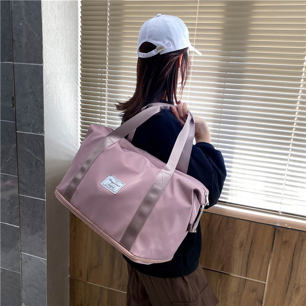 Sportski model prijenosne putne torbe s patentnim zatvaračem