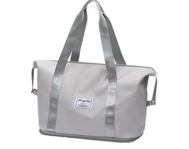 Τσάντα ταξιδιού με στάμπα και χερούλι