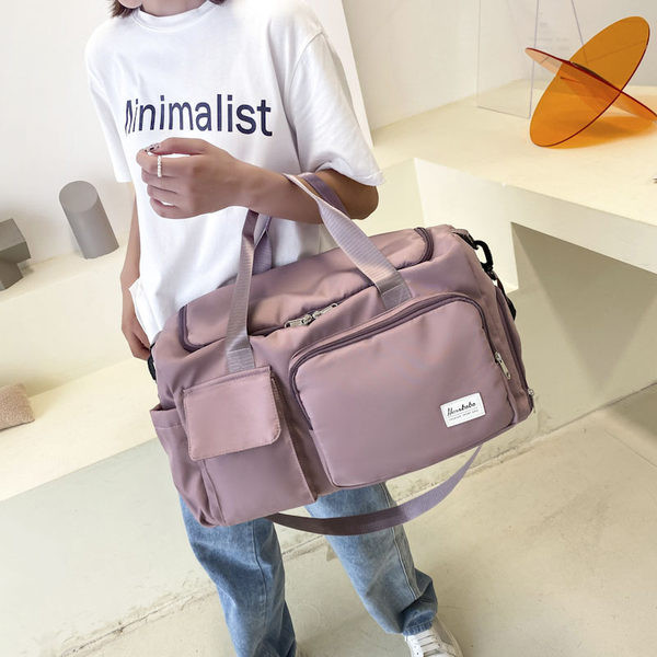 Napi sporttáska sok zsebbel