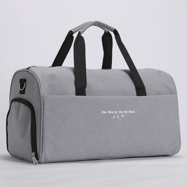 Tekstila monohromatiska ceļojumu soma ar sānu kabatu