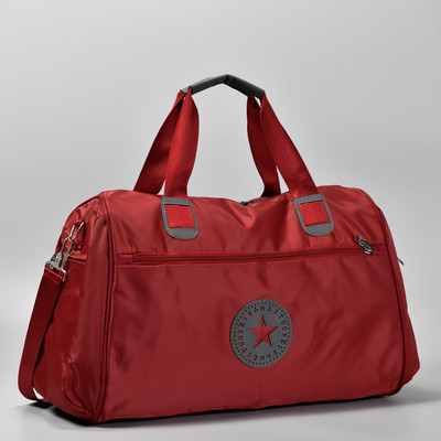 Audekla soma ar priekšējo kabatu un garu rokturi