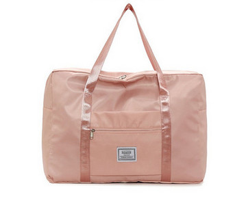 Kézipoggyásztáska külső zsebbel