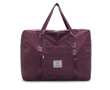 Kézipoggyásztáska külső zsebbel