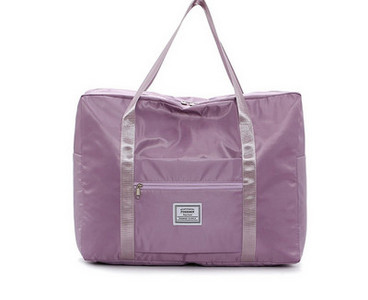 Kézipoggyásztáska külső zsebbel