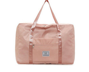 Kézipoggyásztáska külső zsebbel