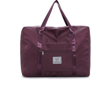 Kézipoggyásztáska külső zsebbel