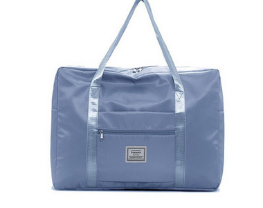 Kézipoggyásztáska külső zsebbel