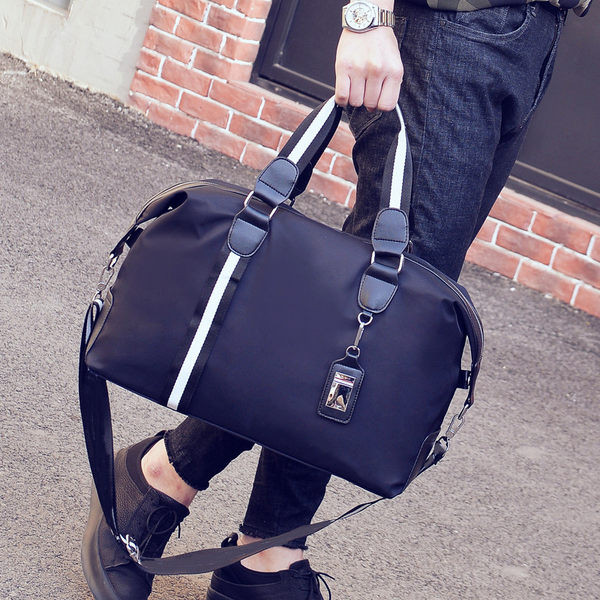 Kézi utazótáska vállpánttal