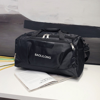 Hordozható kézipoggyász típusú utazótáska