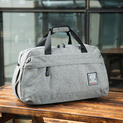 Hordozható utazási kézipoggyász rövid pántokkal