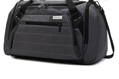 Hordozható utazótáska oldalzsebbel és vállpántokkal