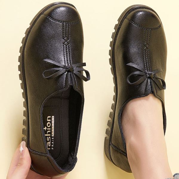 Sieviešu mokasīnu ikdienas modelis ar lentīti