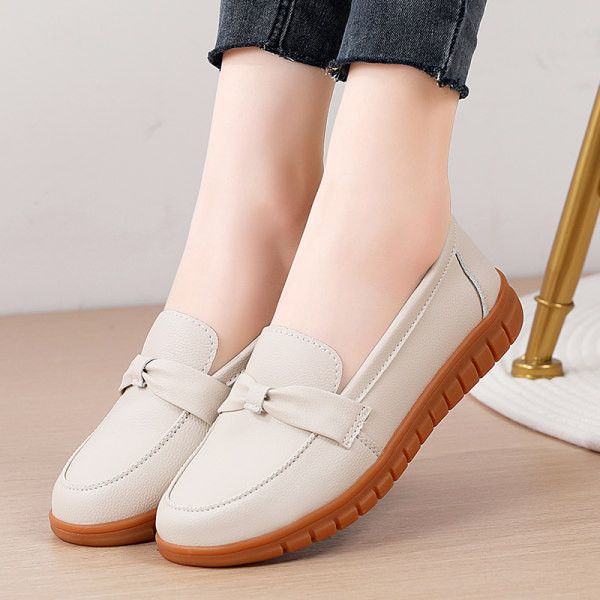 Sieviešu mokasīni no eko ādas ar dekoratīvu lentīti