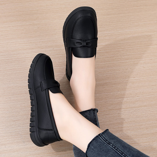 Sieviešu mokasīni no eko ādas ar dekoratīvu lentīti