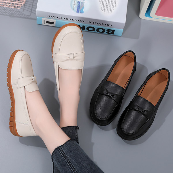 Sieviešu mokasīni ar dekoratīvu lentīti