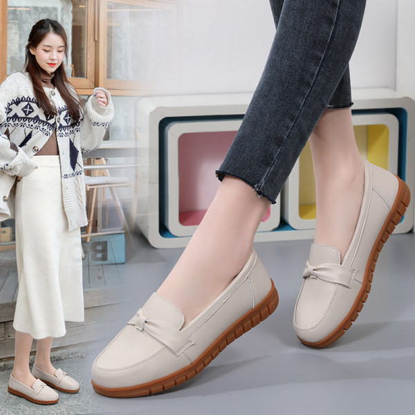 Sieviešu mokasīni ar dekoratīvu lentīti