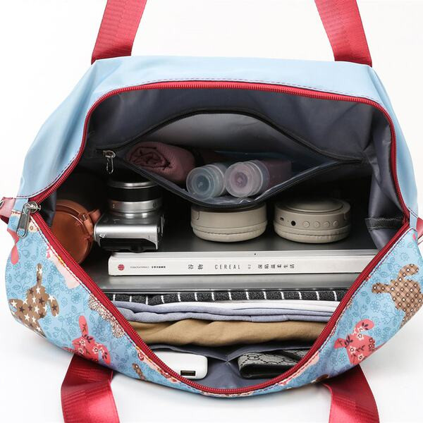 Hordozható női kézipoggyász cipzárral