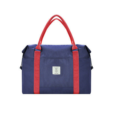 Hordozható utazótáska rövid pántokkal