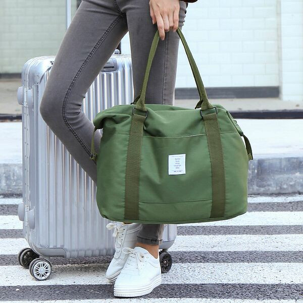 Hordozható utazótáska rövid pántokkal