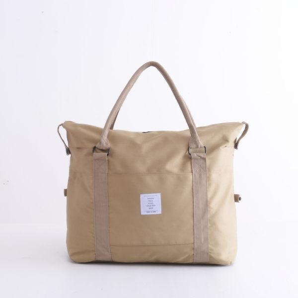 Hordozható utazótáska rövid pántokkal