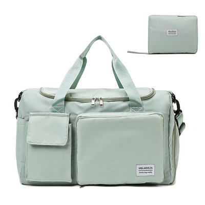 Tekstila soma ar priekšējām kabatām un garu rokturi