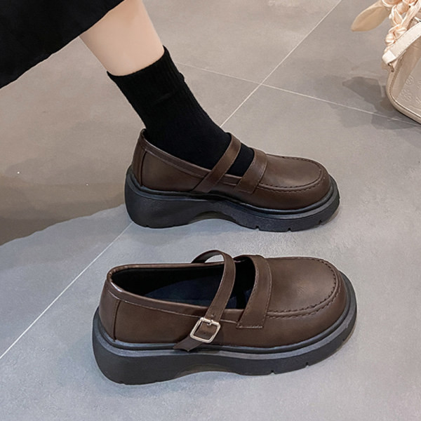 Sieviešu ikdienas apavi ar sprādzi - melnā un brūnā krāsā