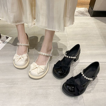 Модерни дамски обувки с панделка и перли