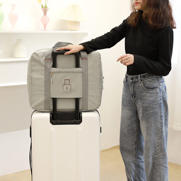 Pārnēsājamas ceļojumu somas gadījuma modelis ar sānu kabatu