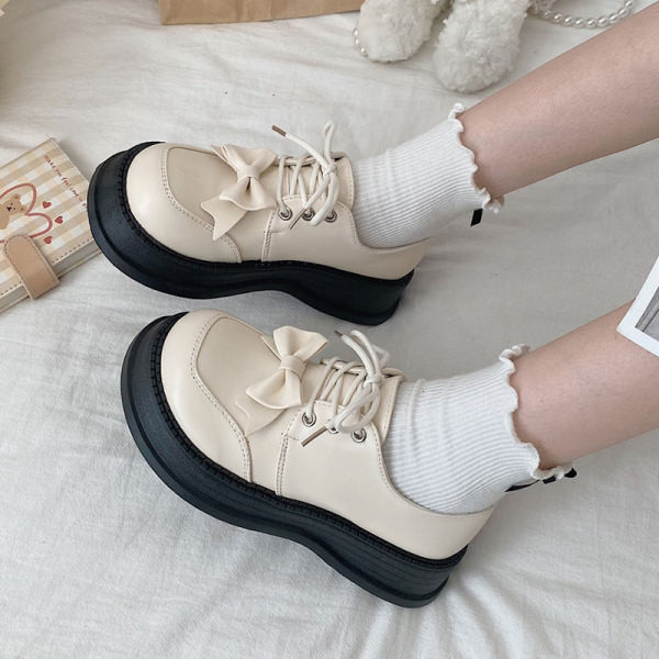 Ženske okrugle cipele s vezicama i trakom