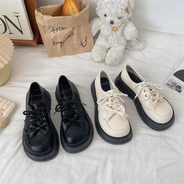 Ženske okrugle cipele s vezicama i trakom