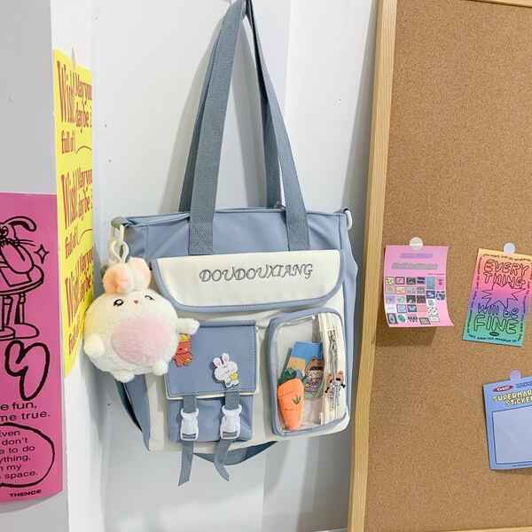 Moderna bērnu soma ar atslēgu piekariņu