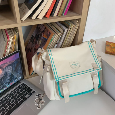 Bērnu tekstila soma ar uzrakstu un plastmasas aizdari