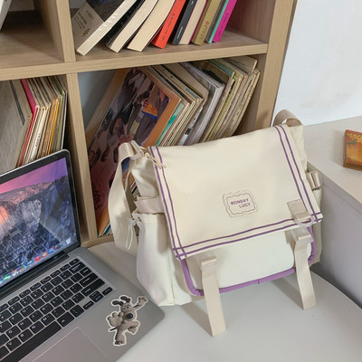 Bērnu tekstila soma ar uzrakstu un plastmasas aizdari