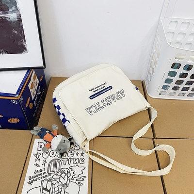 Vászon gyerektáska felirattal és vállfogantyúval