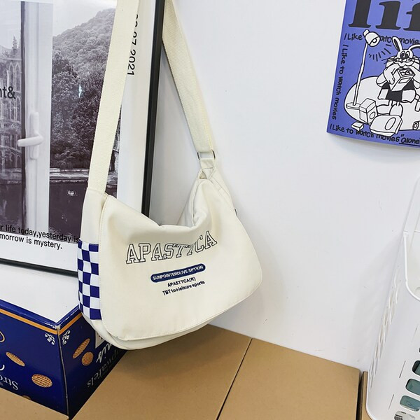 Vászon gyerektáska felirattal és vállfogantyúval