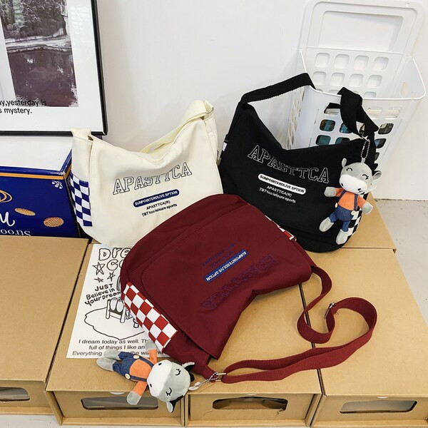 Vászon gyerektáska felirattal és vállfogantyúval