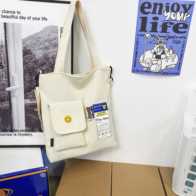 Bērnu ikdienas soma ar apdruku, kabatu un plecu rokturi