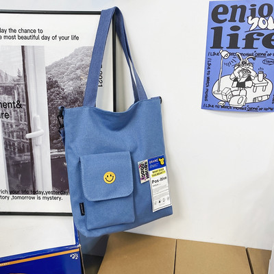 Bērnu ikdienas soma ar apdruku, kabatu un plecu rokturi