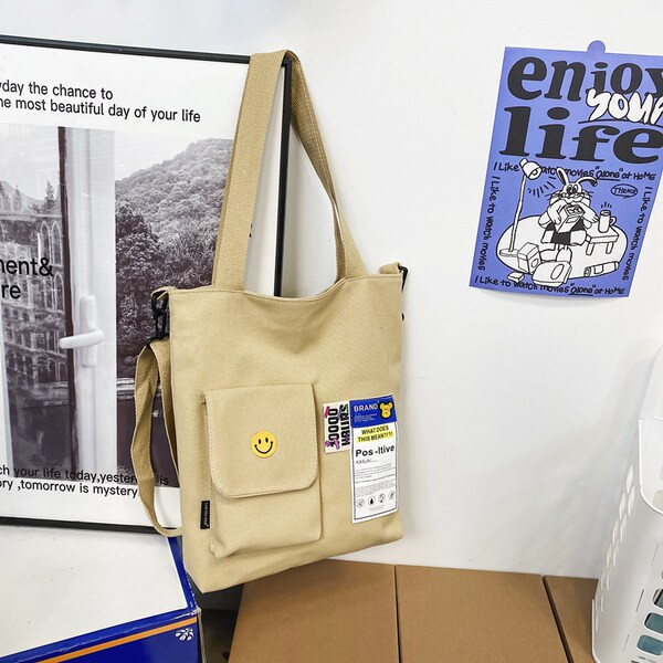 Bērnu ikdienas soma ar apdruku, kabatu un plecu rokturi