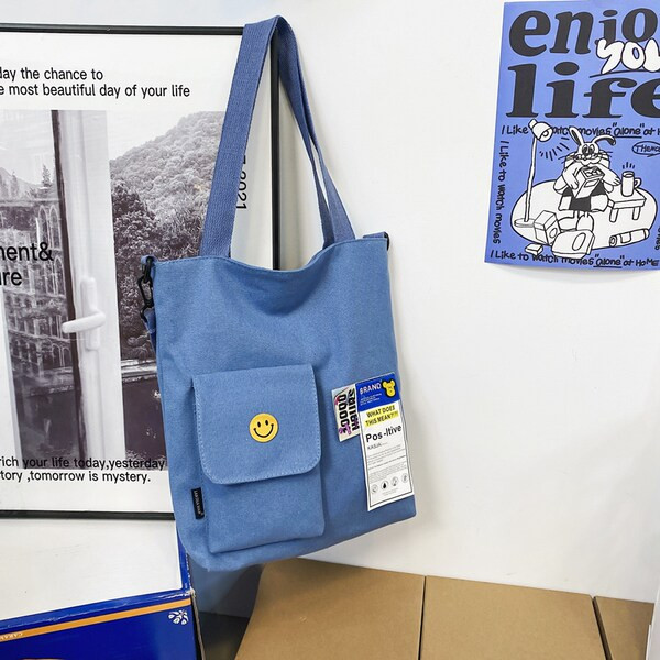 Bērnu ikdienas soma ar apdruku, kabatu un plecu rokturi