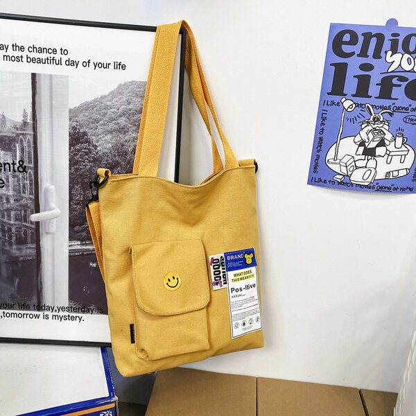 Bērnu ikdienas soma ar apdruku, kabatu un plecu rokturi