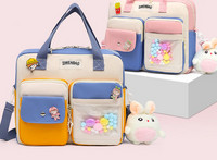 Vízálló gyerektáska elülső zsebbel és felirattal