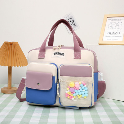 Vízálló gyerektáska elülső zsebbel és felirattal