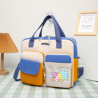 Vízálló gyerektáska elülső zsebbel és felirattal