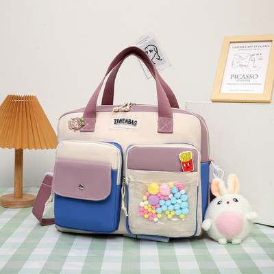 Vízálló gyerektáska elülső zsebbel és felirattal