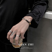 Férfi karkötő kövekkel