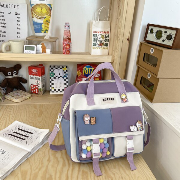 Vízálló gyerek hátizsák zsebbel és rátéttel